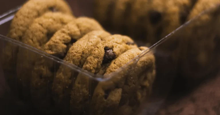 A flat lay of 10 different Rice Krispie Chocolate Chip Cookies variations on a wooden table